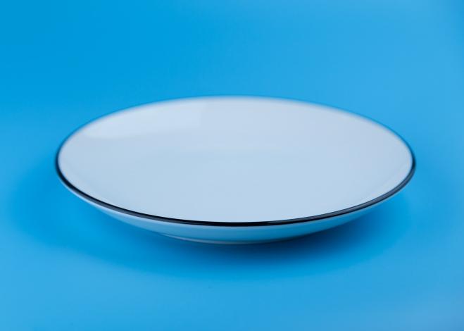 White plate with blue background