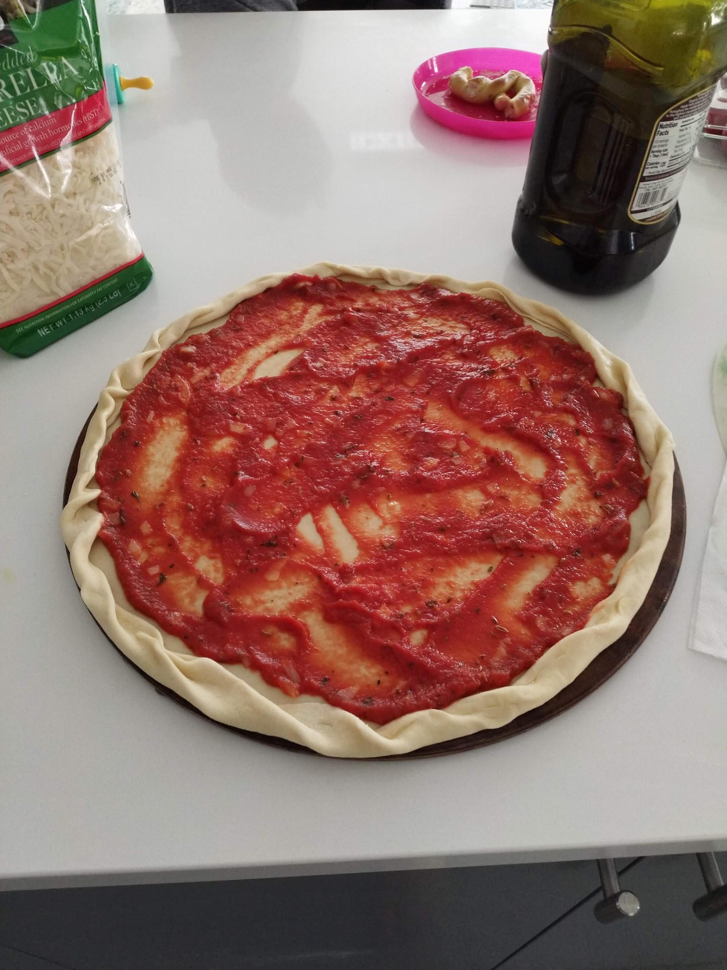 Pizza sauce on pizza crust