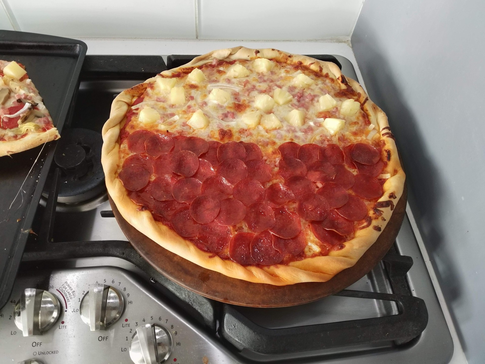 Pizza cooked with pepperoni