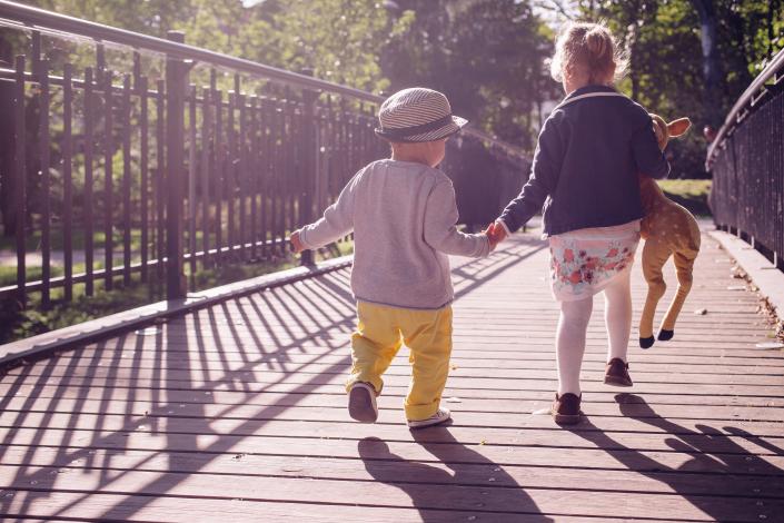 Two kids on bridge