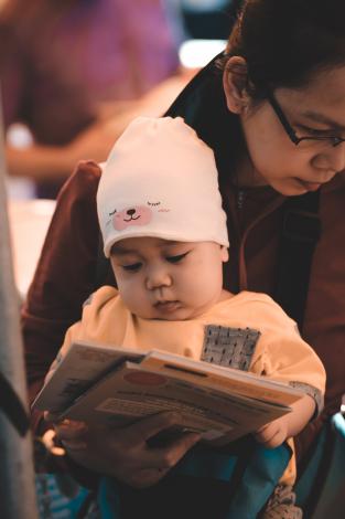 Child and mom with books