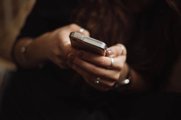 Phone in woman's hands