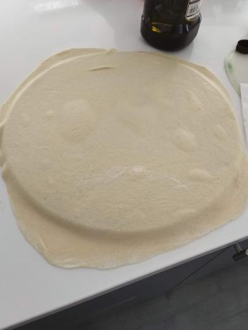 Pizza crust on pizza stone
