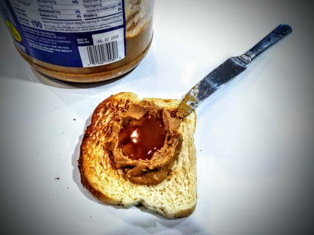 Peanut butter and honey on bread