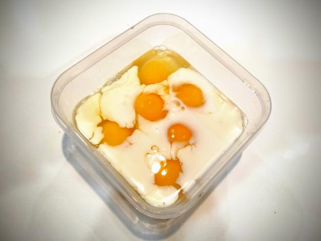 Eggs and milk in container