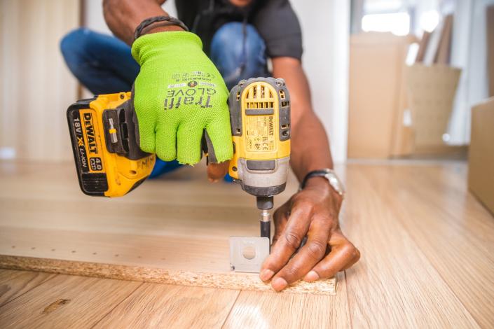 Person using impact driver