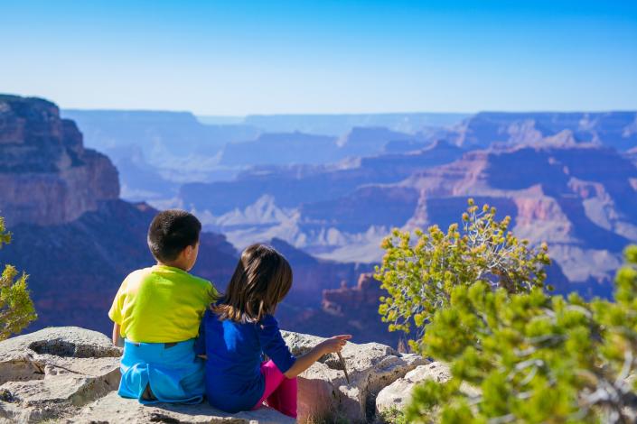 Kids looking out over canyon