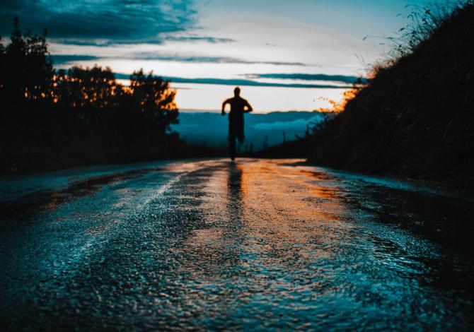 Person running on road