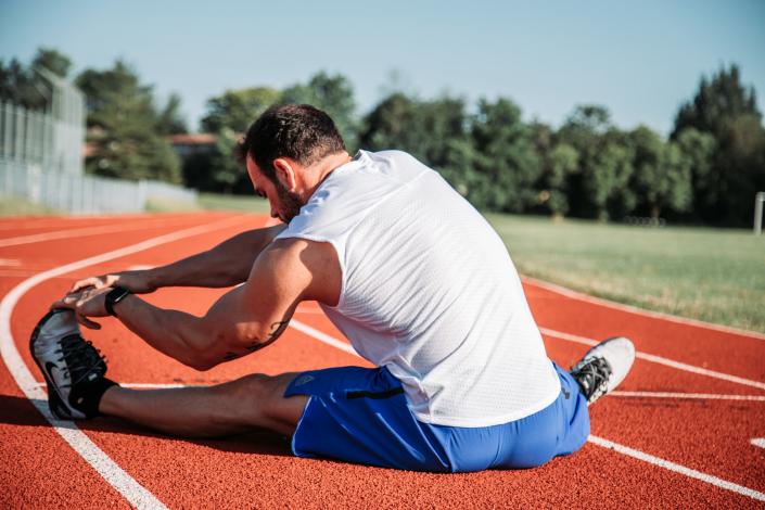 Man stretching legs