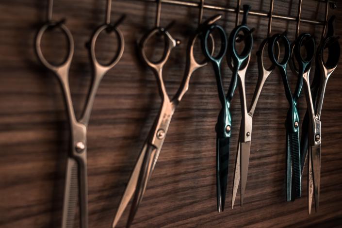 Scissors hanging on wall