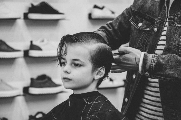 Boy having hair cut