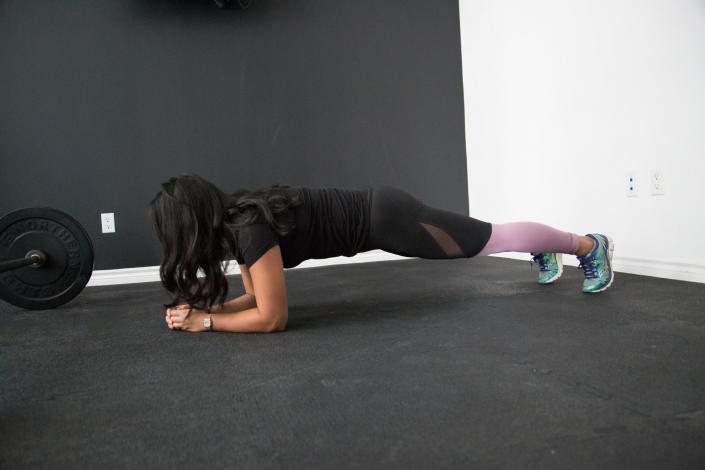 Woman doing plank exercise