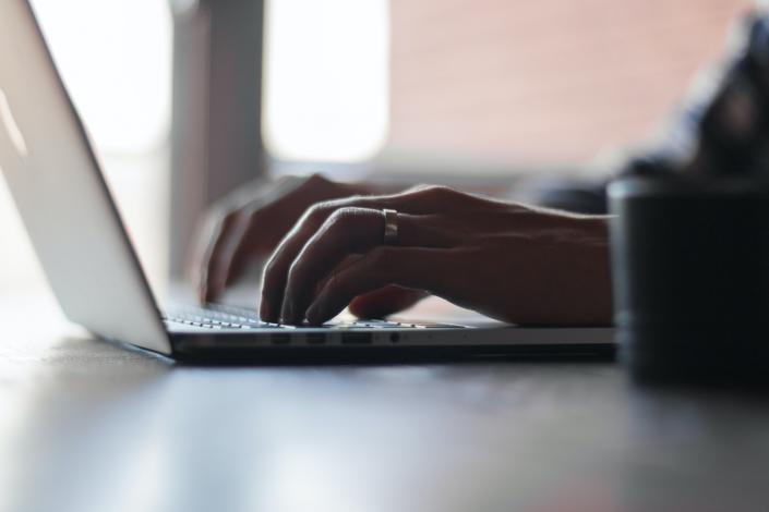 Person using laptop computer