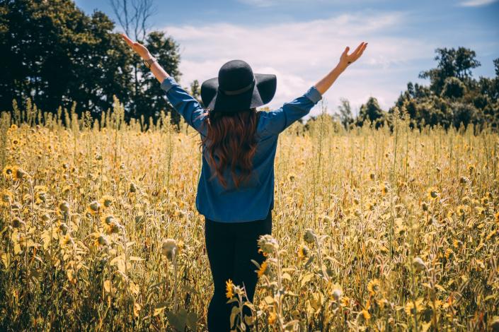Woman standing in field
