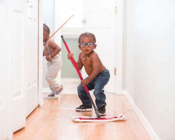 Boy mopping the floor