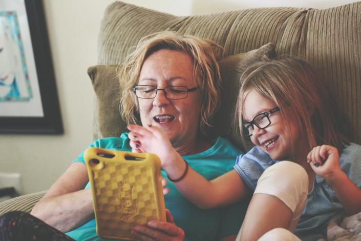 Grandma and girl using tablet