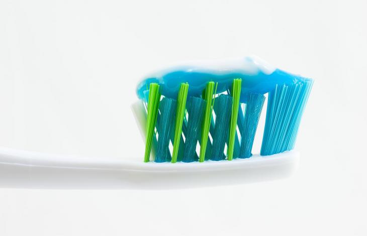 Toothbrush with toothpaste on it