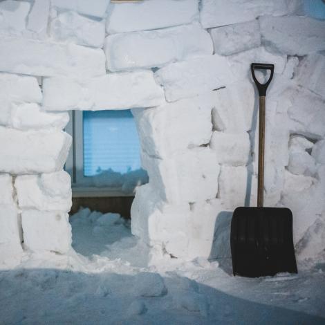 Snow blocks in front of house