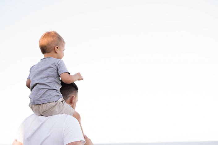 Boy on man's shoulders