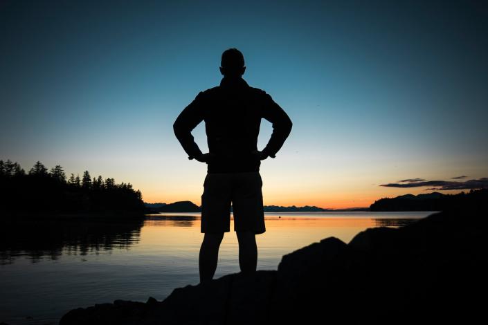 Man standing near water