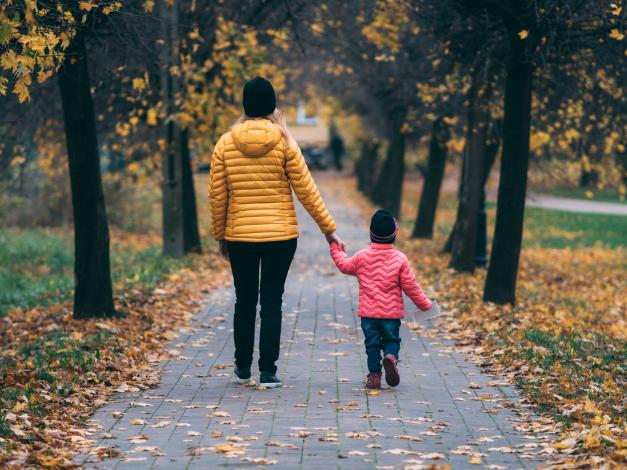 Mother and daughter walking