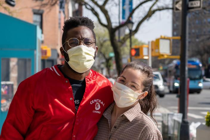 Two people in masks
