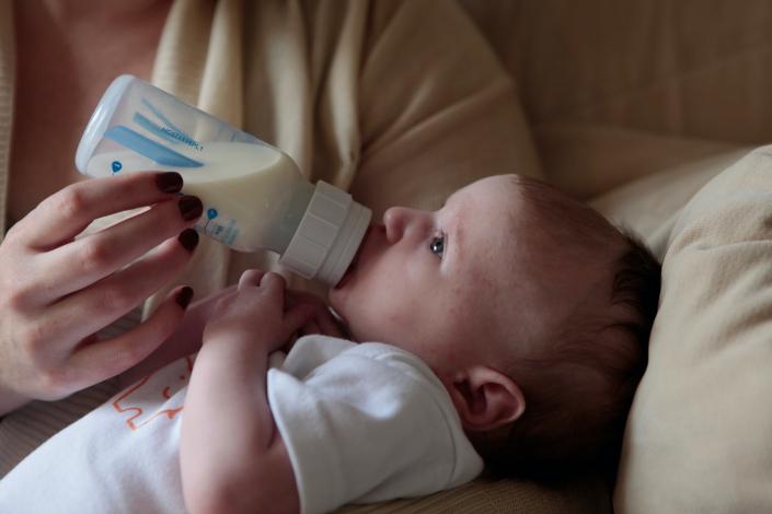 Baby drinking from bottle