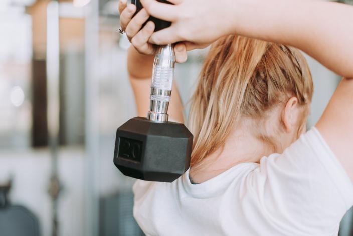 Woman lifting weight