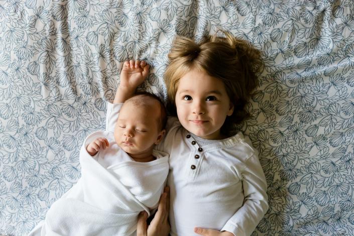 Baby and sibling together