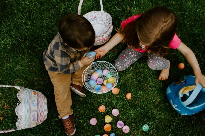 Kids sharing easter egg