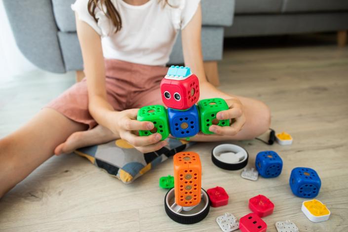 Child playing with toys