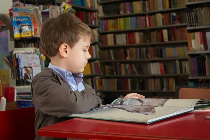 Child reading a book