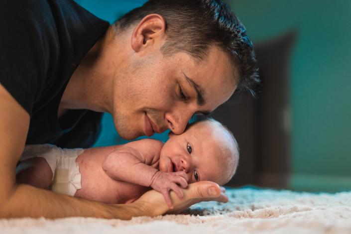 Father with newborn baby