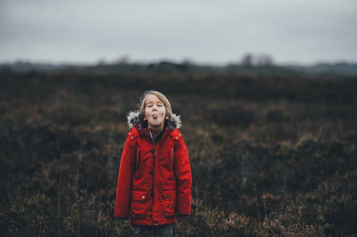 Child sticking tongue out