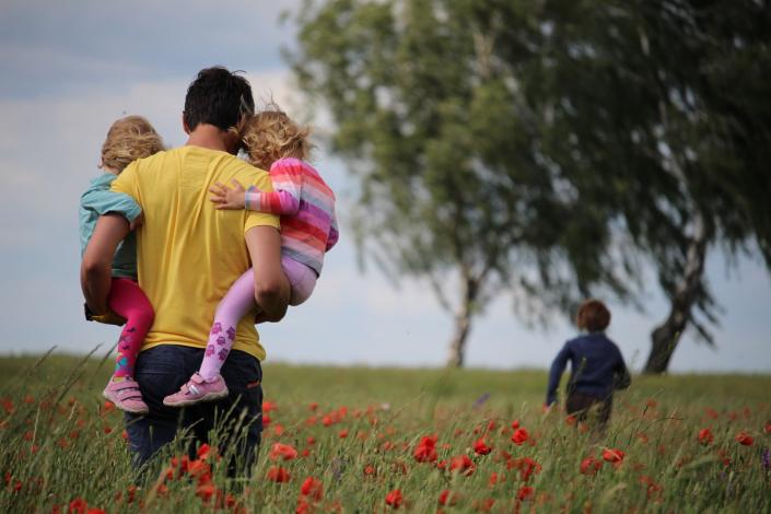 Father holding parents