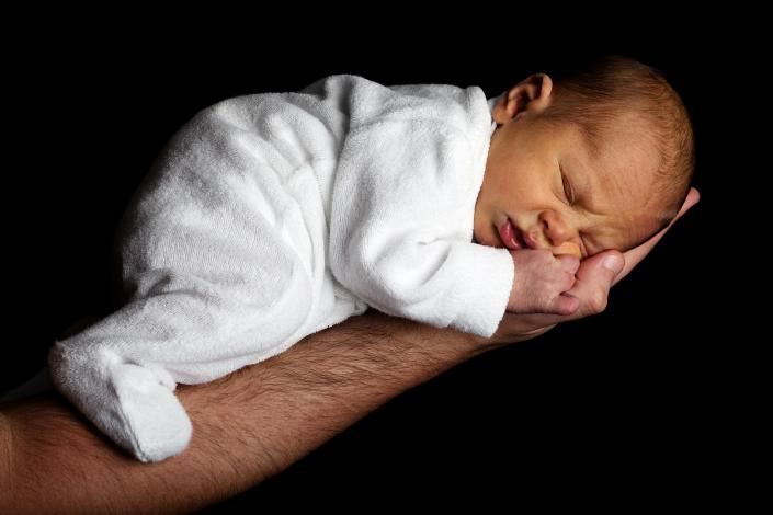 Newborn baby on hand