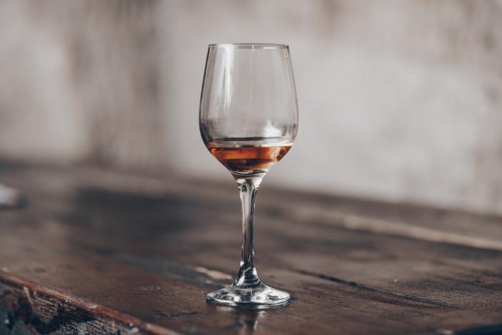 Clear wine glass on table