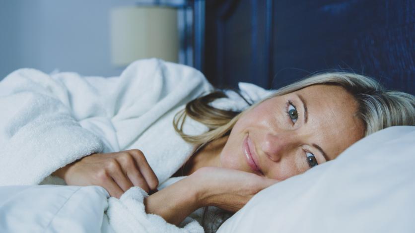 Woman lying in bed