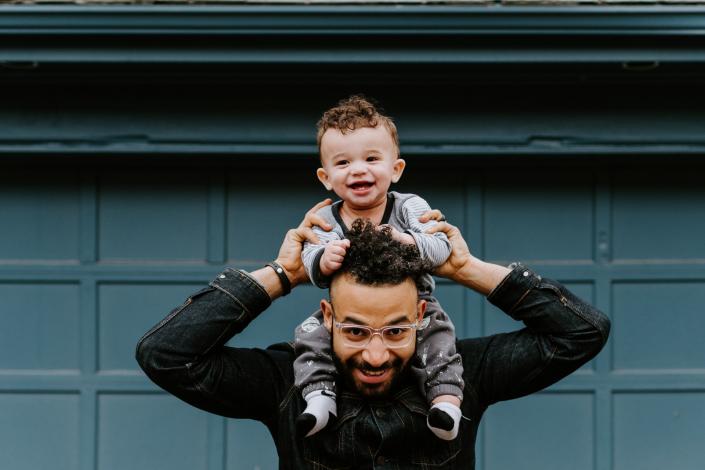 Father with child on shoulders