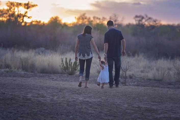 Two parents with a child