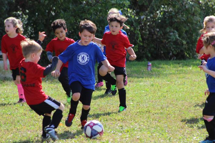 Kids playing soccer