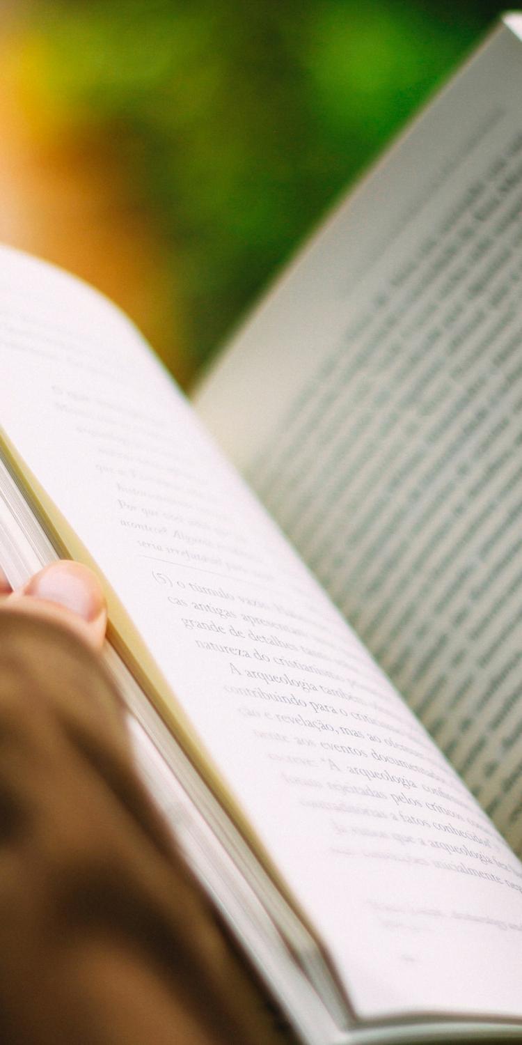 Person holding a book