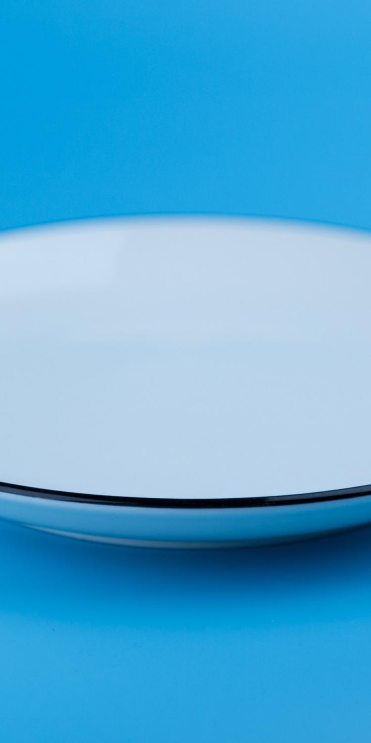 White plate with blue background