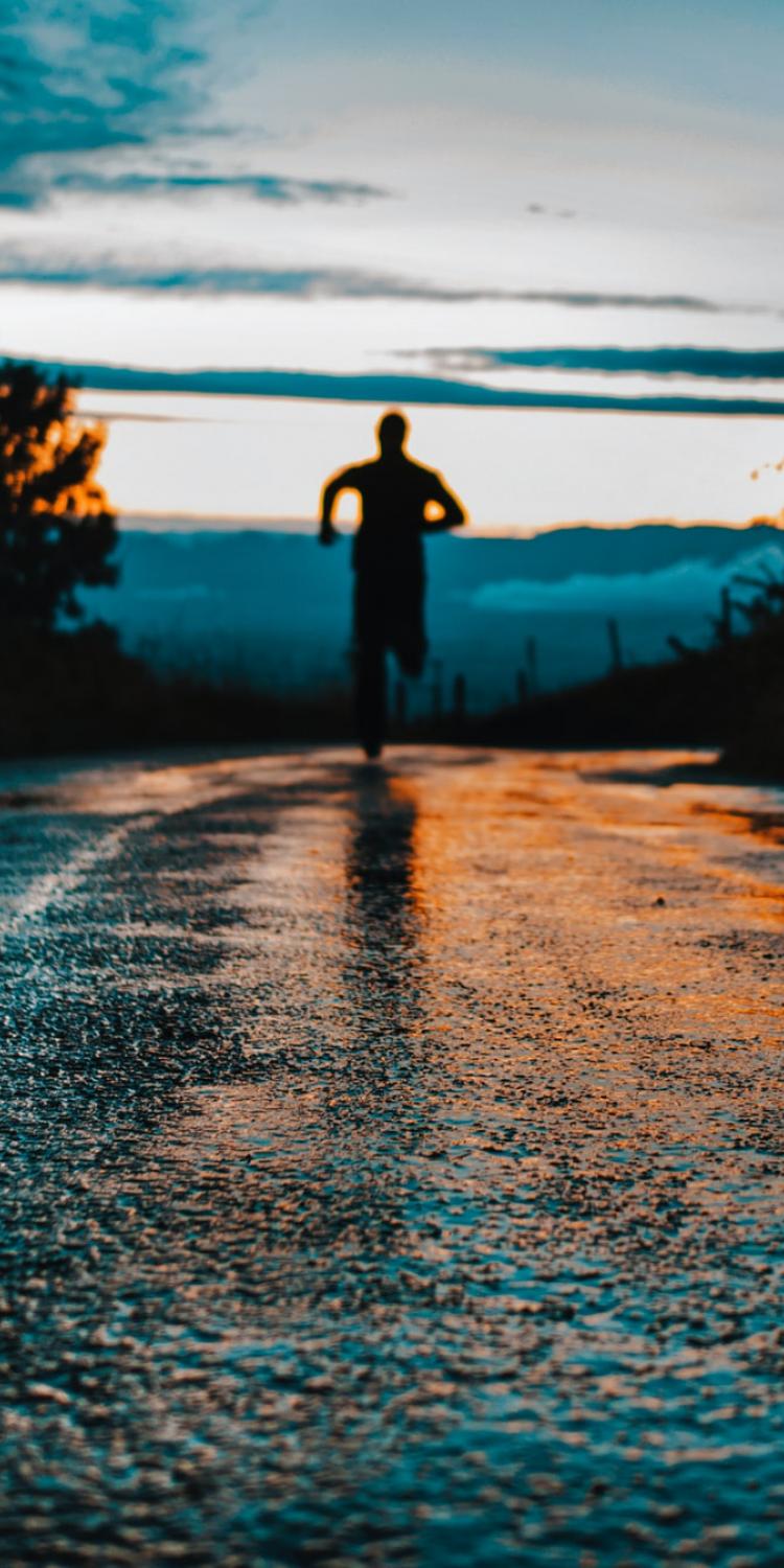 Person running on road