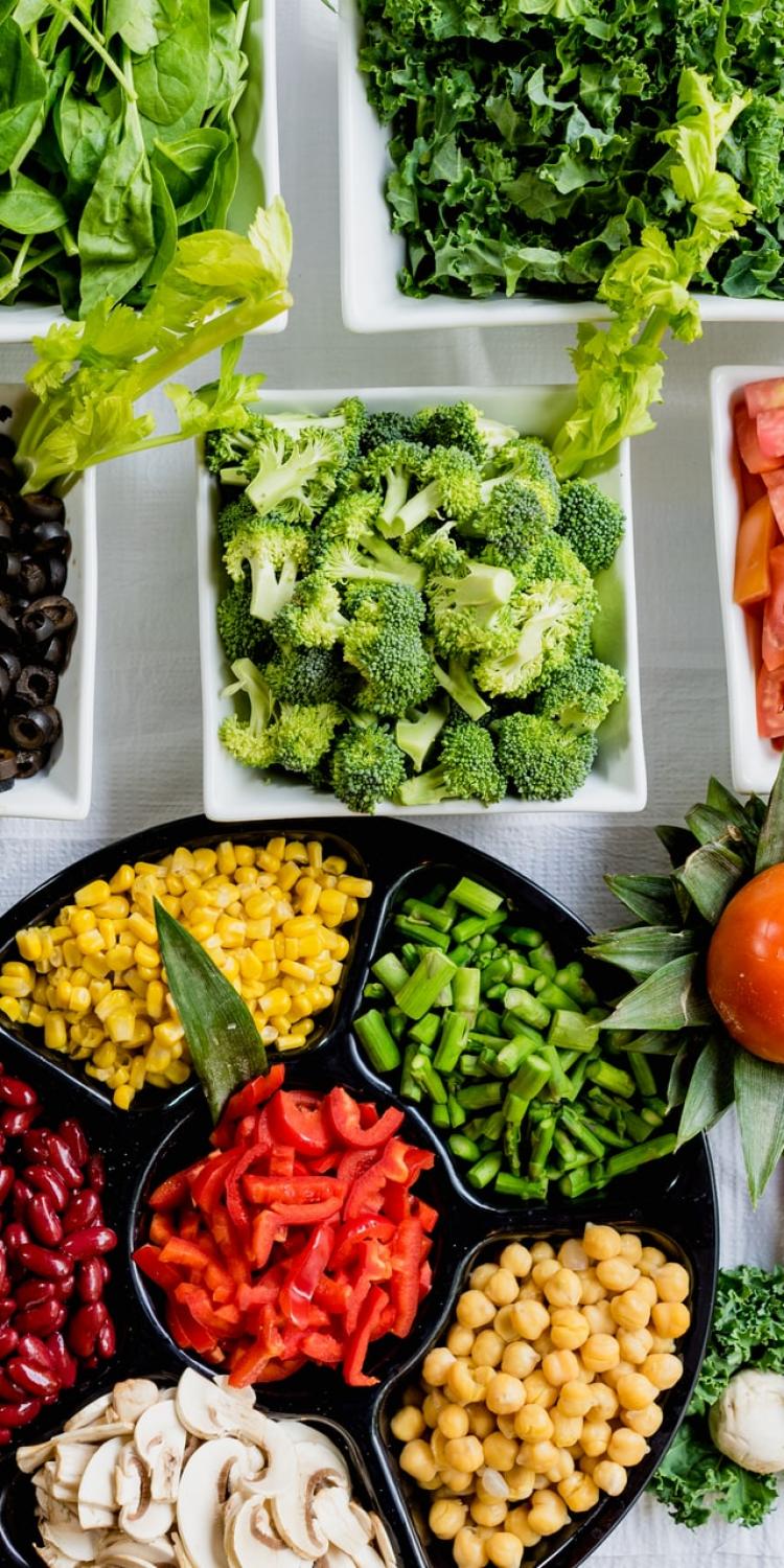 Vegetables cut in bowls