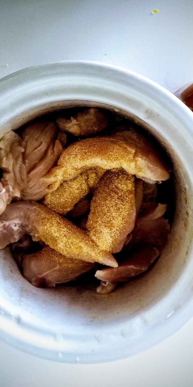Sliced chicken in crock pot
