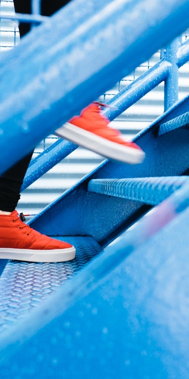 Shoes walking up stairs