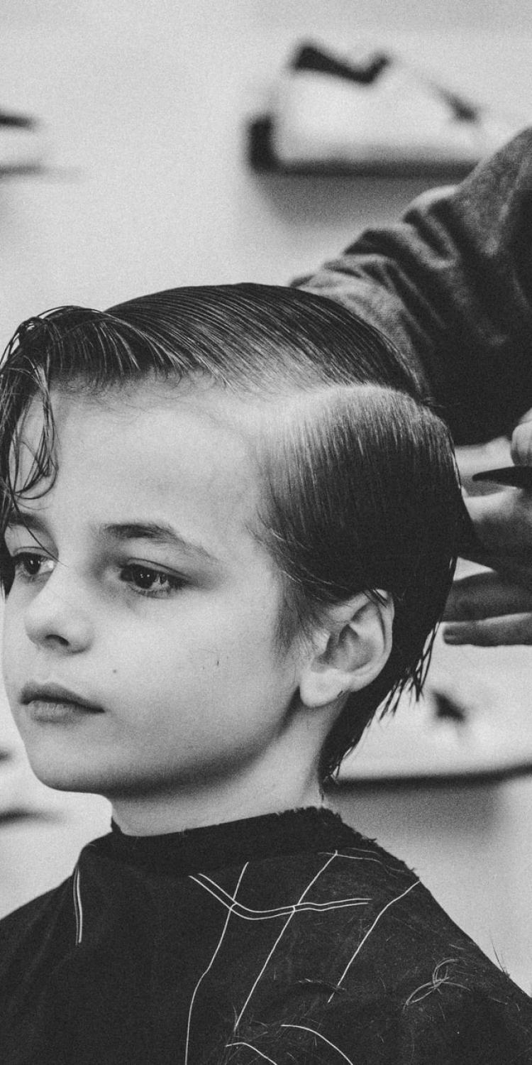 Boy having hair cut