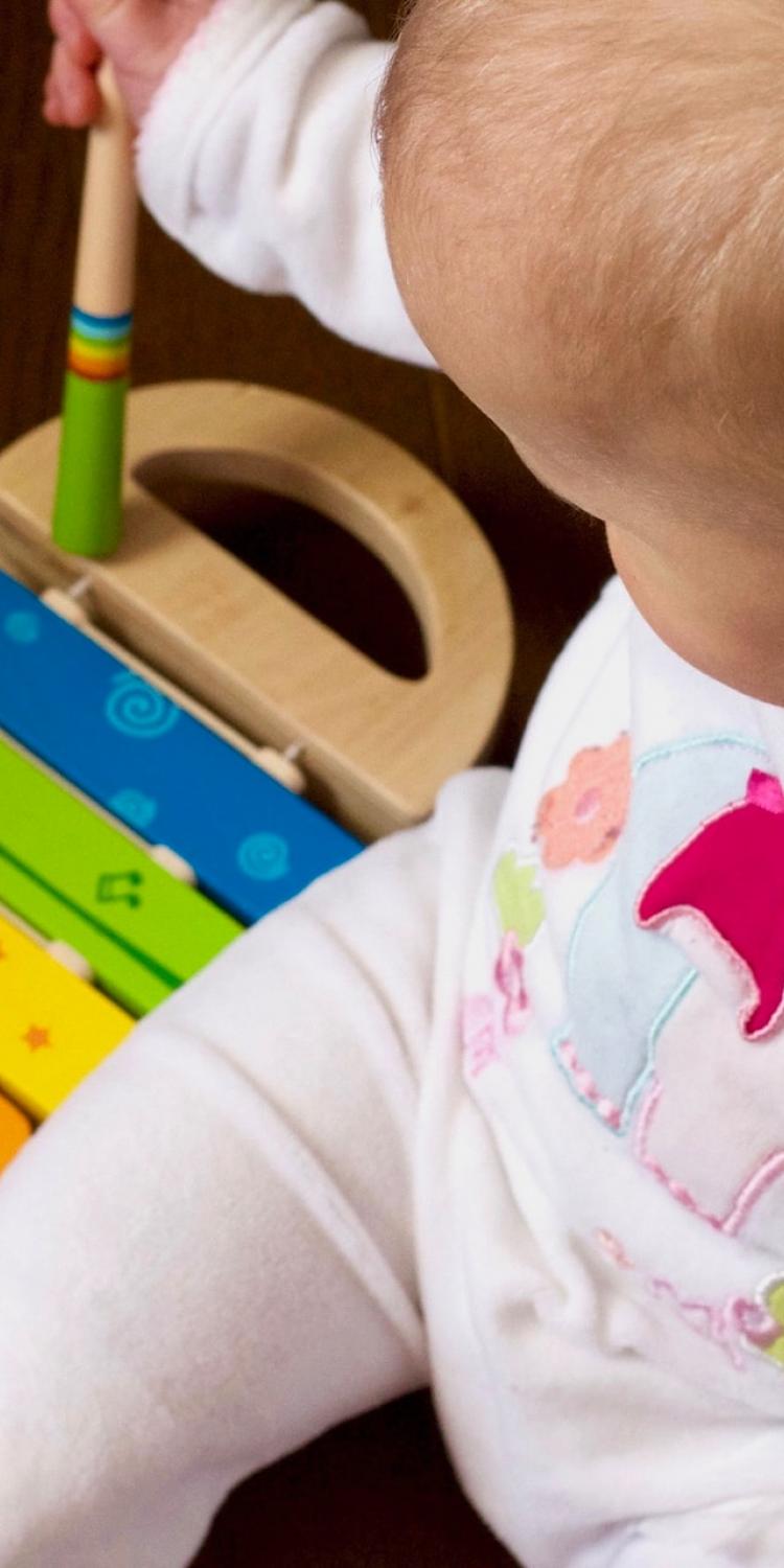 Baby with xylophone