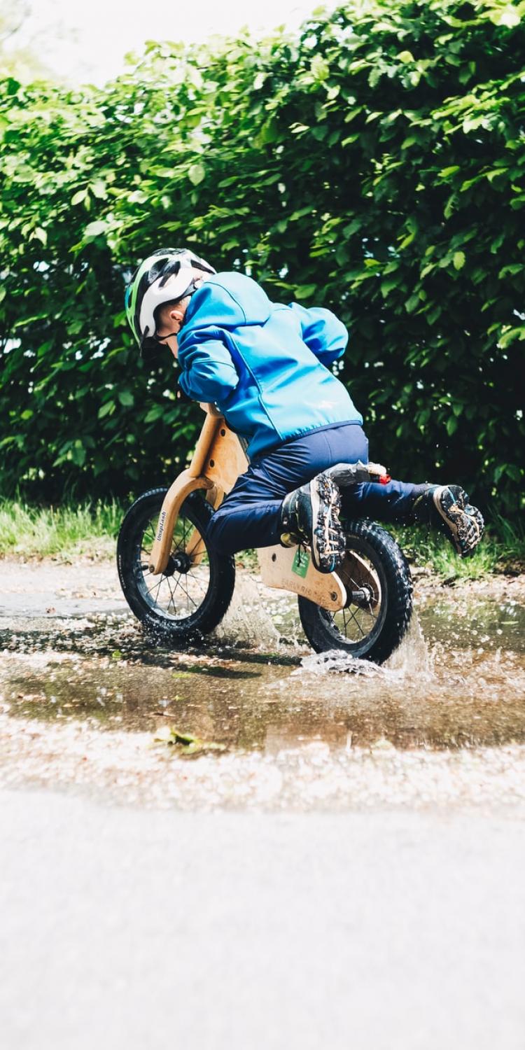 Boy on balance bike